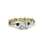 Load image into Gallery viewer, marquise-and-round-eternity-round-cut-diamond-engagement-ring-with-emerald-in-yellow-gold-FDEWB9398RORGEMGR-NL-YG_8b7e9cd8-aa56-4134-a3d4-0415cdccc0eb.jpg?v=1756456713
