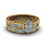 Load image into Gallery viewer, marquise-cut-antique-filigree-wedding-ring-set-with-ice-blue-topaz-in-yellow-gold-FDENS3543MQGICBLTO-NL-YG.jpg
