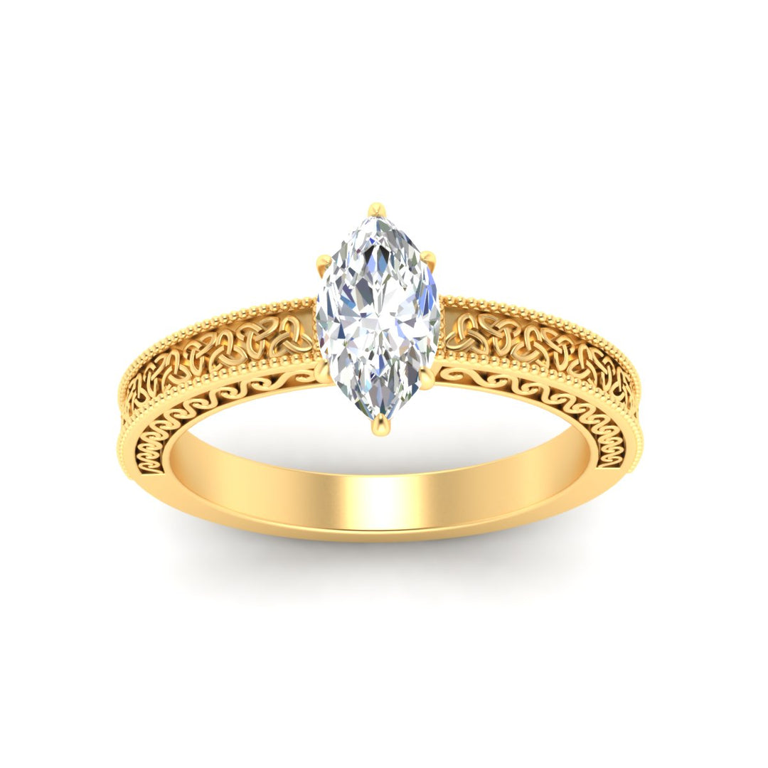 marquise-cut-celtic-engraved-solitaire-ring-in-yellow-gold-fdenr8544mqrangle5-nl-yg
