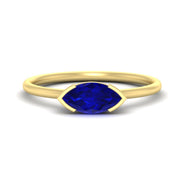 marquise-cut-east-west-sapphire-ring-in-yellow-gold-fdenr11664mqgsablsleep-nl-yg.jpg