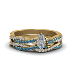 Load image into Gallery viewer, marquise-cut-simple-diamond-twisted-vine-bridal-ring-sets-with-ice-blue-topaz-in-14K-yellow-gold-FD8233MQGICBLTO-NL-YG
