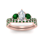 Load image into Gallery viewer, marquise-cut-twisted-floral-prong-emerald-wedding-set-in-rose-gold-FD10257MQGEMGR-ANGLE5-NL-RG_4801d894-02ac-4d25-bec0-03cdca4ff30f?v=1756360138
