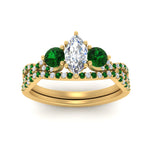 Load image into Gallery viewer, marquise-cut-twisted-floral-prong-emerald-wedding-set-in-yellow-gold-FD10257MQGEMGR-ANGLE5-NL-YG?v=1756360005
