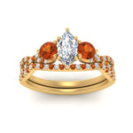 Load image into Gallery viewer, marquise-cut-twisted-floral-prong-orange-sapphire-wedding-set-in-yellow-gold-FD10257MQGSAOR-ANGLE5-NL-YG_d54c46a8-f1fc-470e-81d7-2a6eedd82604?v=1756360138
