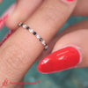 Load image into Gallery viewer, minimalist-0.50-ct-round-cut-shared-prong-diamond-eternity-band-with-black-diamond-in-rose-gold-FDEWB9477