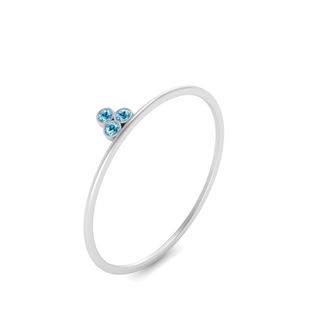minimalist-bezel-3-stone-blue-topaz-ring-in-white-gold-FD9416RORGICBLTO-NL-WG.jpg