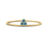 Load image into Gallery viewer, minimalist-bezel-3-stone-blue-topaz-ring-in-yellow-gold-FD9416RORGICBLTO-NL-YG.jpg
