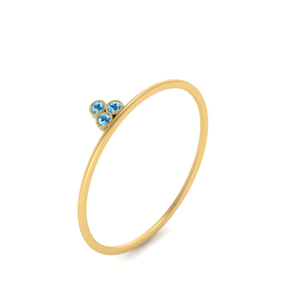 minimalist-bezel-3-stone-blue-topaz-ring-in-yellow-gold-FD9416RORGICBLTO-NL-YG.jpg