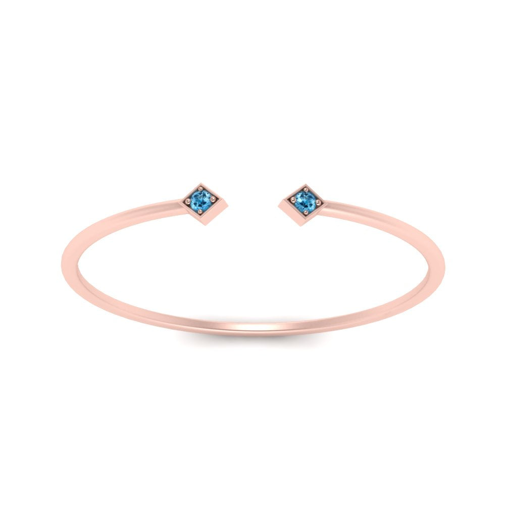 minimalist-open-blue-topaz-ring-in-rose-gold-FD9410RORGICBLTO-NL-RG.jpg