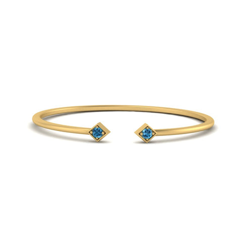minimalist-open-blue-topaz-ring-in-yellow-gold-FD9410RORGICBLTO-NL-YG.jpg