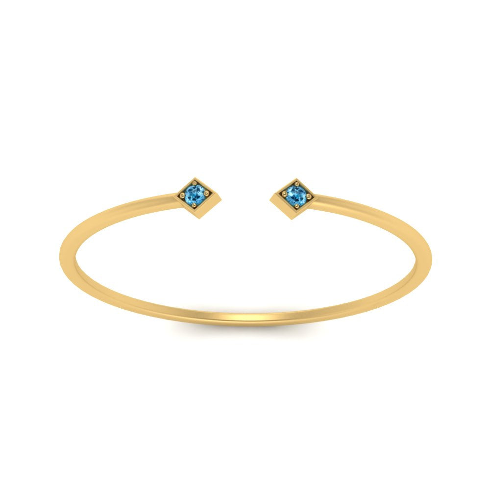 minimalist-open-blue-topaz-ring-in-yellow-gold-FD9410RORGICBLTO-NL-YG.jpg