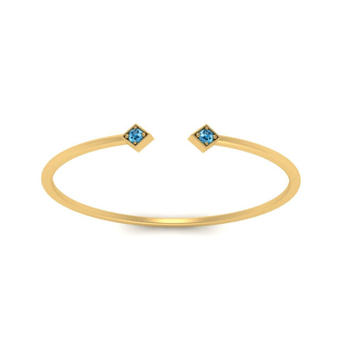 minimalist-open-blue-topaz-ring-in-yellow-gold-FD9410RORGICBLTO-NL-YG.jpg