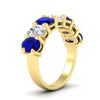 Load image into Gallery viewer, oval-cut-seven-stone-sapphire-4-ct-anniversary-band-in-yellow-gold-fdwb8008ovgsablangle2-4.00ct-nl-yg.jpg