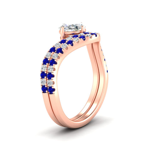 oval-cut-twisted-pave-engagement-ring-with-curved-sapphire-band-in-rose-gold-fdens11617ovgsablangle2-nl-rg.jpg