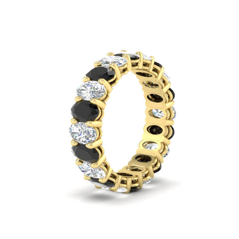 oval-diamond-eternity-wedding-band-7-carat-with-black-diamond-in-yellow-gold-fdewb8324ovgblackangle2-5.50x3.50mm-nl-yg