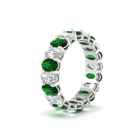 oval-diamond-eternity-wedding-band-7-carat-with-emerald-in-white-gold-fdewb8324ovgemgrangle2-5.50x3.50mm-nl-wg