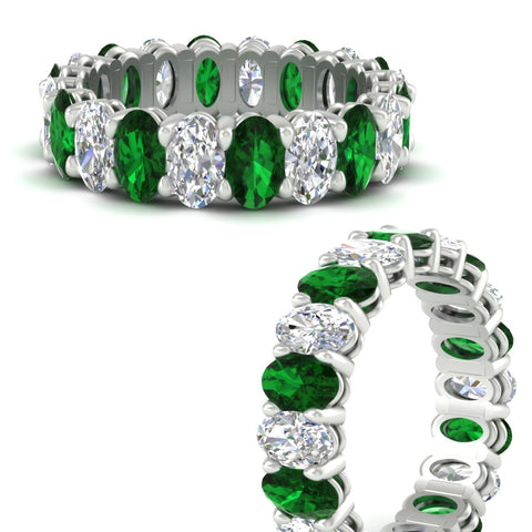 oval-diamond-eternity-wedding-band-7-carat-with-emerald-in-white-gold-fdewb8324ovgemgrangle3-5.50x3.50mm-nl-wg