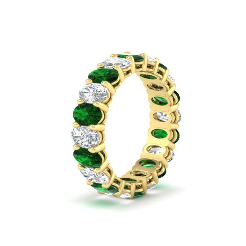 oval-diamond-eternity-wedding-band-7-carat-with-emerald-in-yellow-gold-fdewb8324ovgemgrangle2-5.50x3.50mm-nl-yg