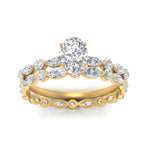 Load image into Gallery viewer, oval-diamond-floating-marquise-accent-ring-with-eternity-wedding-band-in-yellow-gold-FDEWB9398OVANGLE5-NL-YG_8d5b0519-edcd-489f-b366-8431b070551f.jpg?v=1758802234