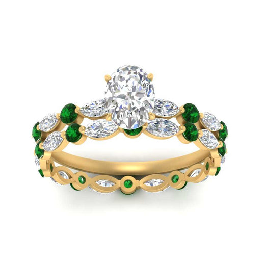 oval-emerald-floating-marquise-accent-ring-with-eternity-wedding-band-in-yellow-gold-FDEWB9398OVGEMGRANGLE5-NL-YG.jpg?v=1758802083