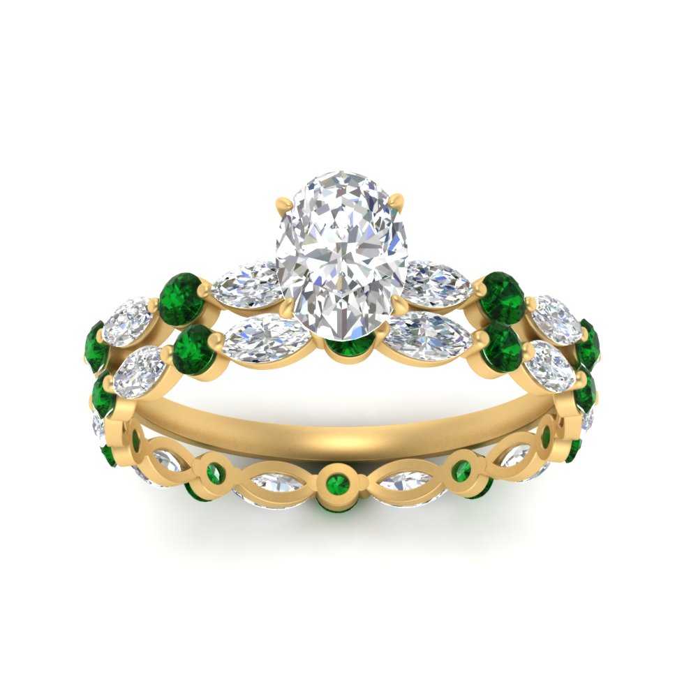 oval-emerald-floating-marquise-accent-ring-with-eternity-wedding-band-in-yellow-gold-FDEWB9398OVGEMGRANGLE5-NL-YG_fb44d5ff-504a-41a8-8f8b-908d39dbeadb.jpg?v=1758802152