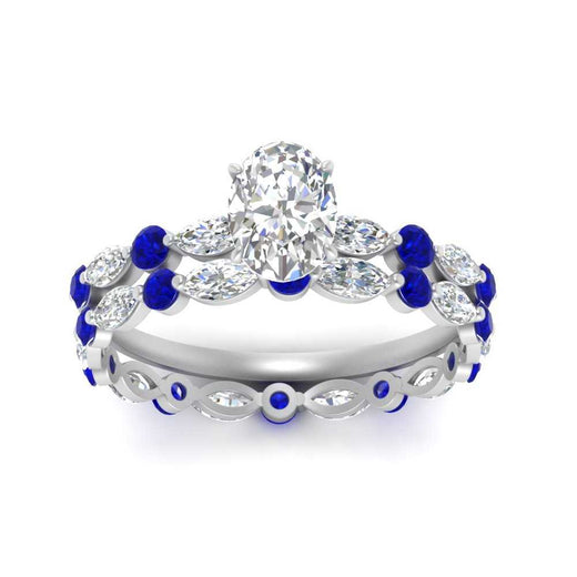 oval-sapphire-floating-marquise-accent-ring-with-eternity-wedding-band-in-white-gold-FDEWB9398OVGSABLANGLE5-NL-WG.jpg?v=1758802081
