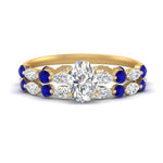 Load image into Gallery viewer, oval-sapphire-floating-marquise-accent-ring-with-eternity-wedding-band-in-yellow-gold-FDEWB9398OVGSABL-NL-YG_bdd29337-7680-4e70-84c1-14e89ef6b8ff.jpg?v=1758802100