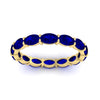 Load image into Gallery viewer, oval-shape-5-carat-sideways-sapphire-wedding-band-in-yellow-gold-FDEWB8425OVGSABLANGLE5-5.00CT-NL-YG