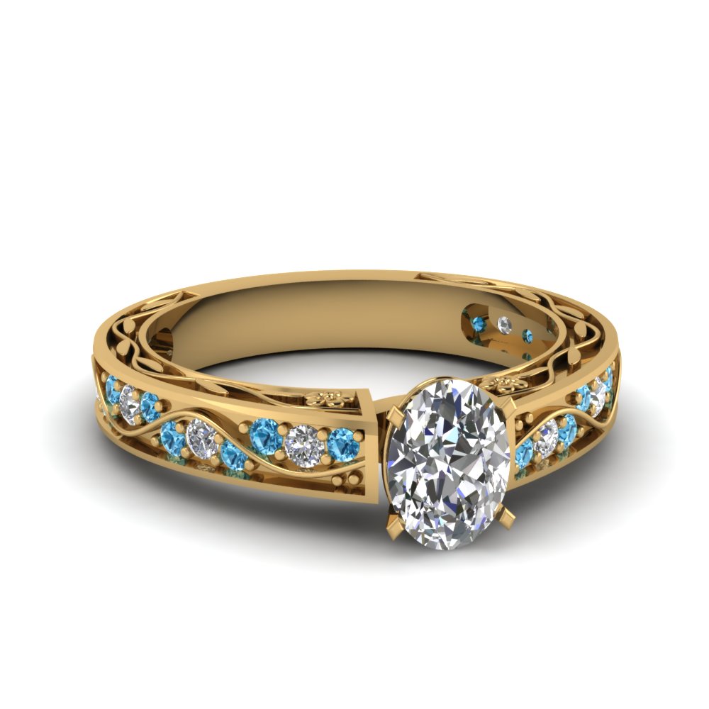 oval-shaped-antique-filigree-diamond-ring-with-ice-blue-topaz-in-14K-yellow-gold-FDENS3543OVRGICBLTO-NL-YG