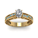 Load image into Gallery viewer, oval-shaped-antique-filigree-diamond-ring-with-ice-blue-topaz-in-14K-yellow-gold-FDENS3543OVRGICBLTOANGLE5-NL-YG
