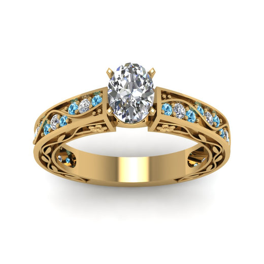 oval-shaped-antique-filigree-diamond-ring-with-ice-blue-topaz-in-14K-yellow-gold-FDENS3543OVRGICBLTOANGLE5-NL-YG_b8215518-0eda-49bc-87cc-00b7d825bb44