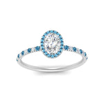 Load image into Gallery viewer, oval-shaped-blue-topaz-halo-petite-engagement-ring-in-white-gold-FD8523OVRGICBLTOANGLE3-NL-WG
