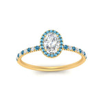 Load image into Gallery viewer, oval-shaped-blue-topaz-halo-petite-engagement-ring-in-yellow-gold-FD8523OVRGICBLTOANGLE3-NL-YG
