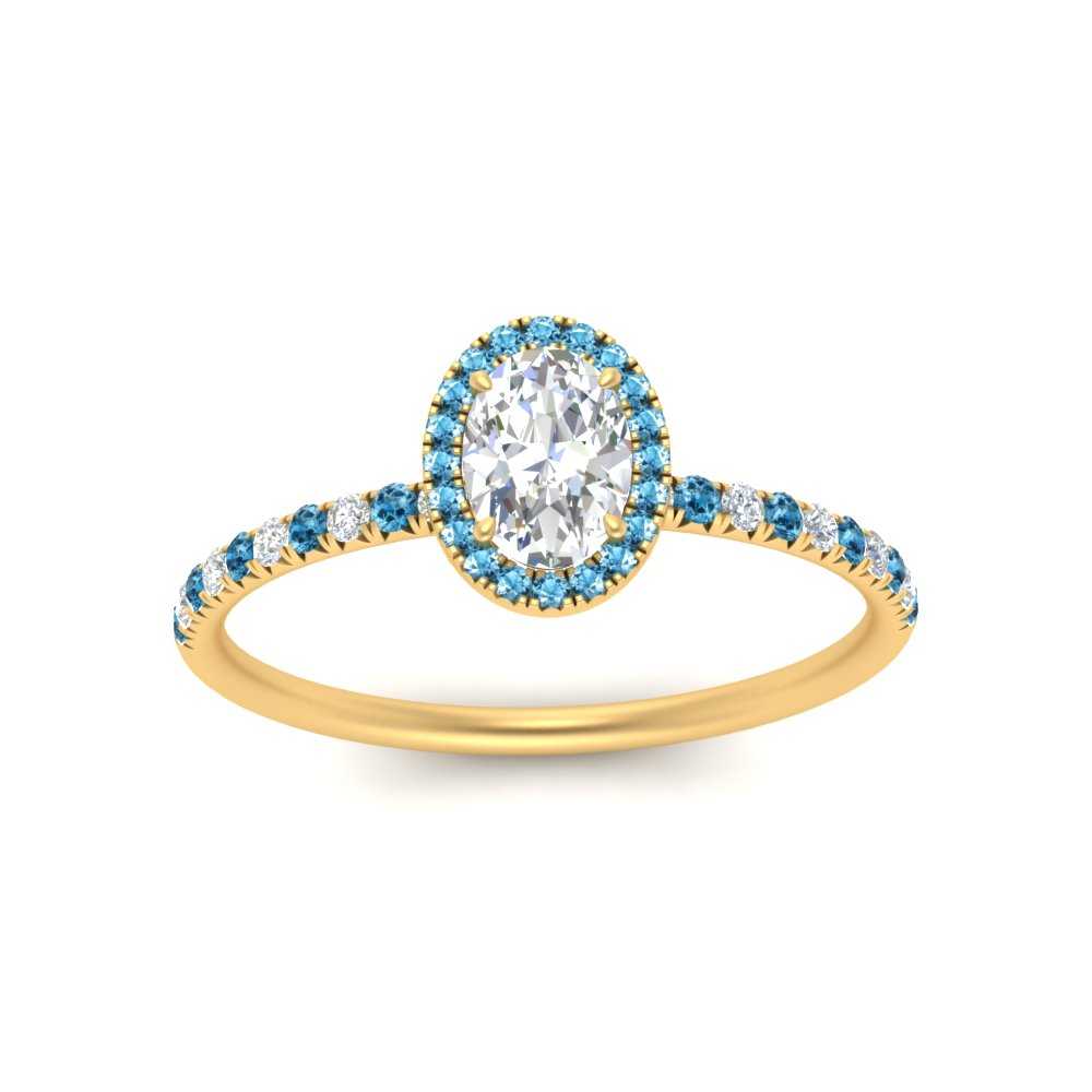 oval-shaped-blue-topaz-halo-petite-engagement-ring-in-yellow-gold-FD8523OVRGICBLTOANGLE3-NL-YG