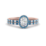 Load image into Gallery viewer, oval-shaped-blue-topaz-halo-wedding-ring-set-in-rose-gold-FD8523OVGICBLTO-NL-RG

