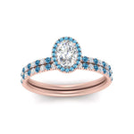 Load image into Gallery viewer, oval-shaped-blue-topaz-halo-wedding-ring-set-in-rose-gold-FD8523OVGICBLTO-NL-RG
