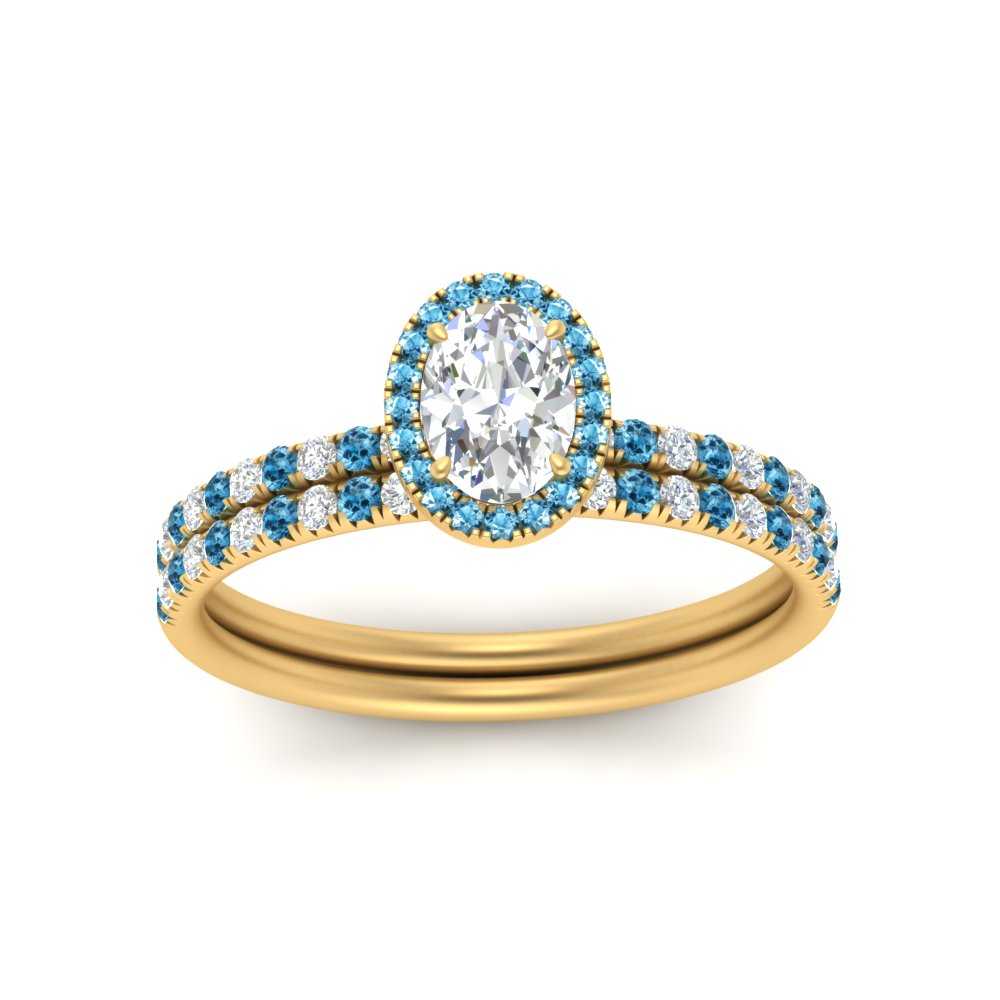 oval-shaped-blue-topaz-halo-wedding-ring-set-in-yellow-gold-FD8523OVGICBLTO-NL-YG