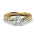 Thumbnail 77 - oval-shaped-blue-topaz-twisted-vine-engagement-ring-in-yellow-gold-FD9127OVRGICBLTO-NL-YG