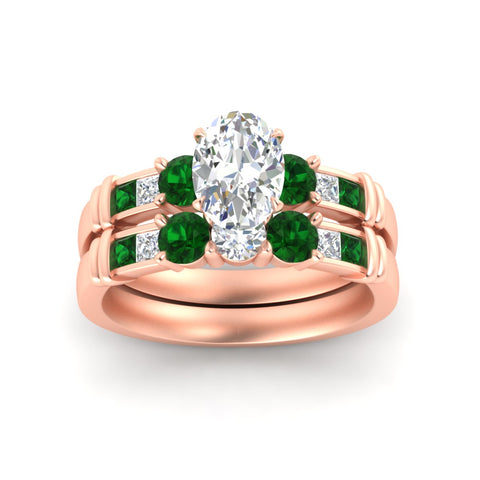 oval-shaped-bridal-ring-set-with-emerald-princess-channel-accents-in-rose-gold-fdens286ovgemgrangle5-nl-rg.jpg
