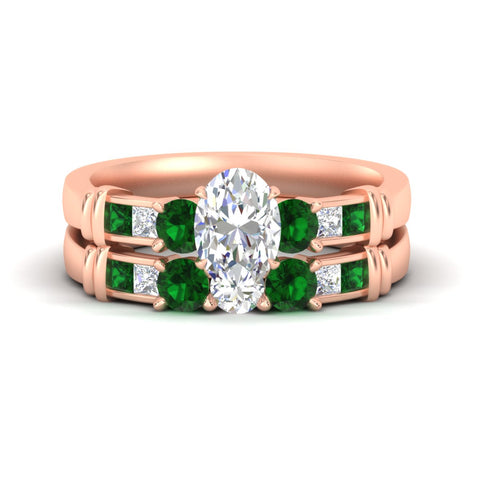 oval-shaped-bridal-ring-set-with-emerald-princess-channel-accents-in-rose-gold-fdens286ovgemgrsleep-nl-rg.jpg