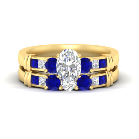 oval-shaped-bridal-ring-set-with-sapphire-princess-channel-accents-in-yellow-gold-fdens286ovgsablsleep-nl-yg.jpg