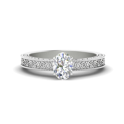 Oval Shaped Celtic Engraved Solitaire Engagement Ring