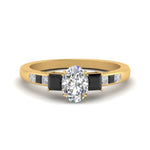 Load image into Gallery viewer, oval-shaped-channel-three-stone-diamond-engagement-ring-with-black-diamond-in-yellow-gold-FDENS205OVRGBLACK-NL-YG.jpg
