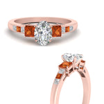 Load image into Gallery viewer, oval-shaped-channel-three-stone-diamond-engagement-ring-with-orange-sapphire-in-rose-gold-FDENS205OVRGSAOR-NL-RG.jpg
