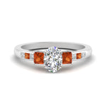 Load image into Gallery viewer, oval-shaped-channel-three-stone-diamond-engagement-ring-with-orange-sapphire-in-white-gold-FDENS205OVRGSAOR-NL-WG.jpg
