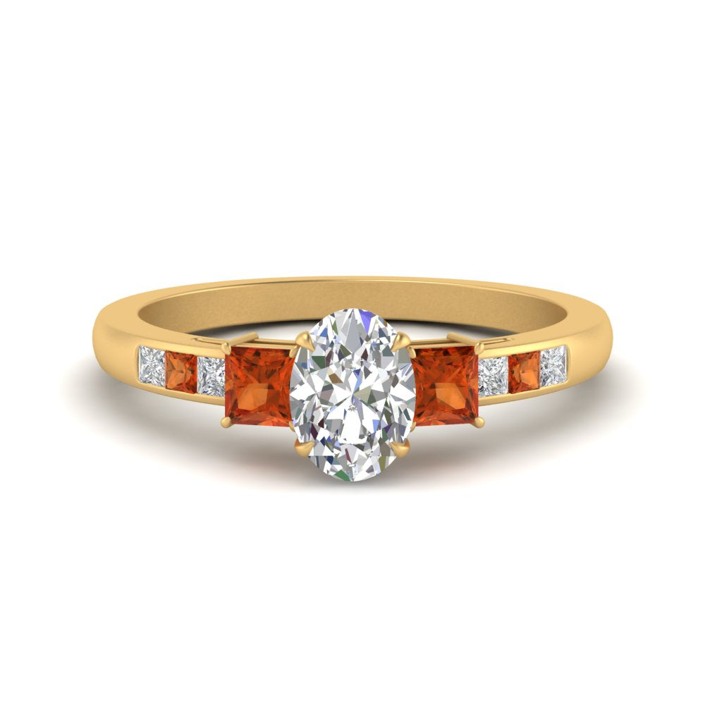 oval-shaped-channel-three-stone-diamond-engagement-ring-with-orange-sapphire-in-yellow-gold-FDENS205OVRGSAOR-NL-YG.jpg