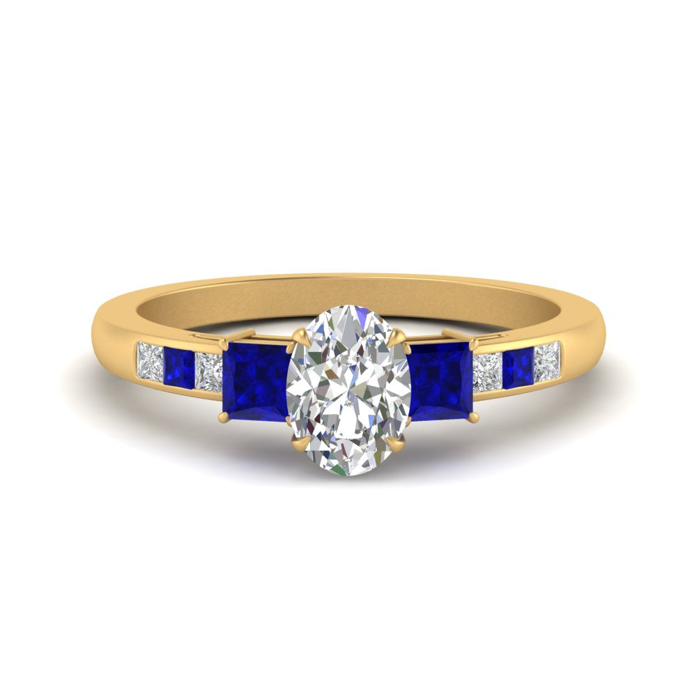 oval-shaped-channel-three-stone-diamond-engagement-ring-with-sapphire-in-yellow-gold-FDENS205OVRGSABL-NL-YG.jpg