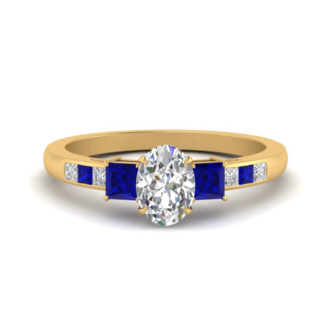 oval-shaped-channel-three-stone-diamond-engagement-ring-with-sapphire-in-yellow-gold-FDENS205OVRGSABL-NL-YG.jpg