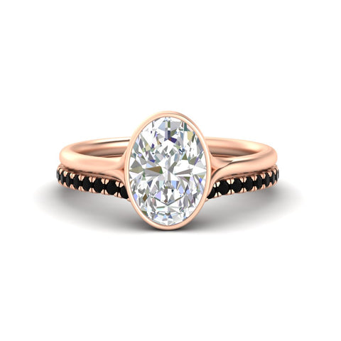 oval-shaped-diamond-bezel-solitaire-ring-with-black-diamond-band-in-rose-gold-FD11229OVGBLACK-NL-RG.jpg?v=1758702860