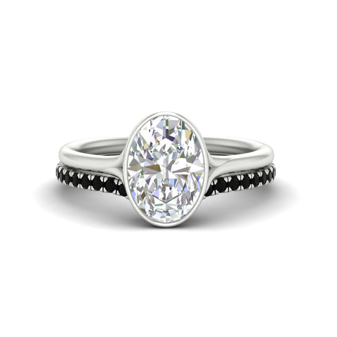oval-shaped-diamond-bezel-solitaire-ring-with-black-diamond-band-in-white-gold-FD11229OVGBLACK-NL-WG.jpg?v=1758702860